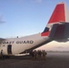 Coast Guard aircrews load supplies for Puerto Rico