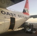 Coast Guard aircrews load relief supplies for Puerto Rico