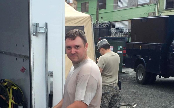 Tech. Sgt. Zach Ruoff, part of a six-person team from the 269th Combat Communications Squadron, Springfield Ohio Air National Guard Base, prepares cables to extend communications services to St. Thomas, U.S. Virgin Islands in the aftermath of Hurricane Ma
