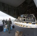 Coast Guard aircrews load relief supplies for Puerto Rico