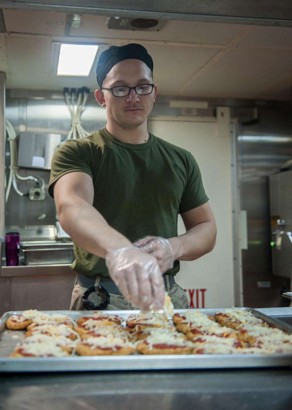 USS America Sailor prepares food