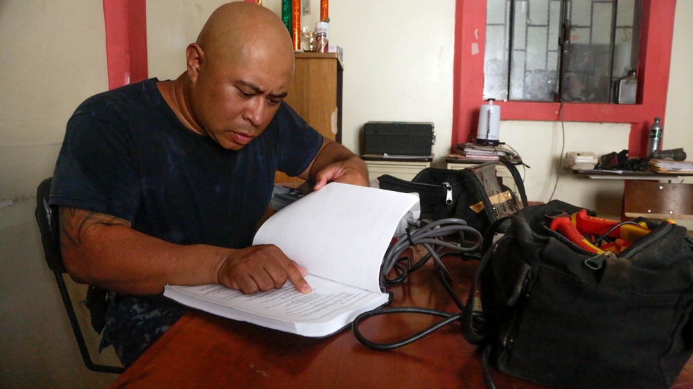 Hospital Corpsman Repairs Guatemalan Hospital Equipment during SPS 17