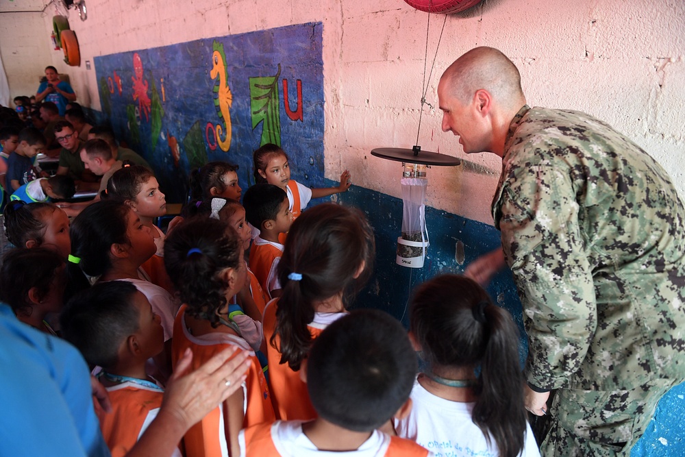 Sailors and Marines Interact with Students during SPS 17 COMREL