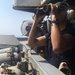 Sailor Stands Forward Lookout Watch on Nimitz