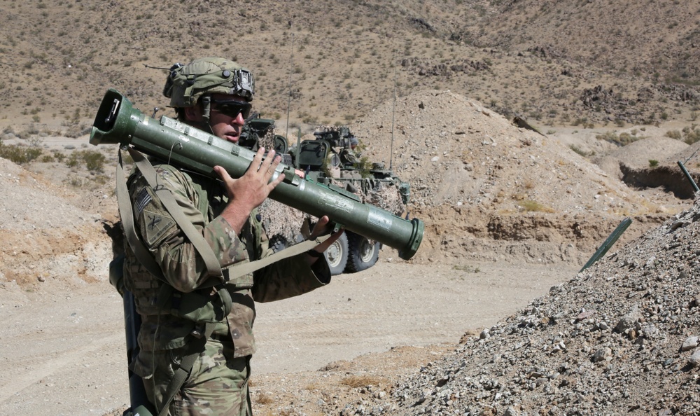 A U.S. Army Soldier assigned to Bravo Troop, 8th Squadron, 1st Cavalry Regiment, 2nd Brigade Combat Team, 2nd Infantry Division, prepares to fire an AT-4