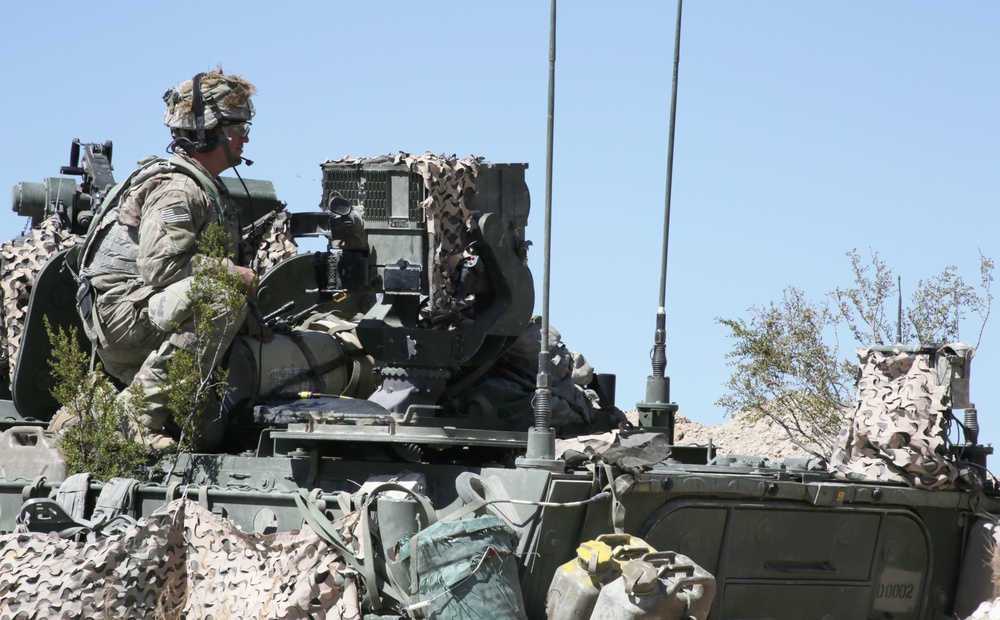 A U.S. Army Soldier assigned to Bravo Troop, 8th Squadron, 1st Cavalry Regiment, 2nd Brigade Combat Team, 2nd Infantry Division, provides security from defensive position