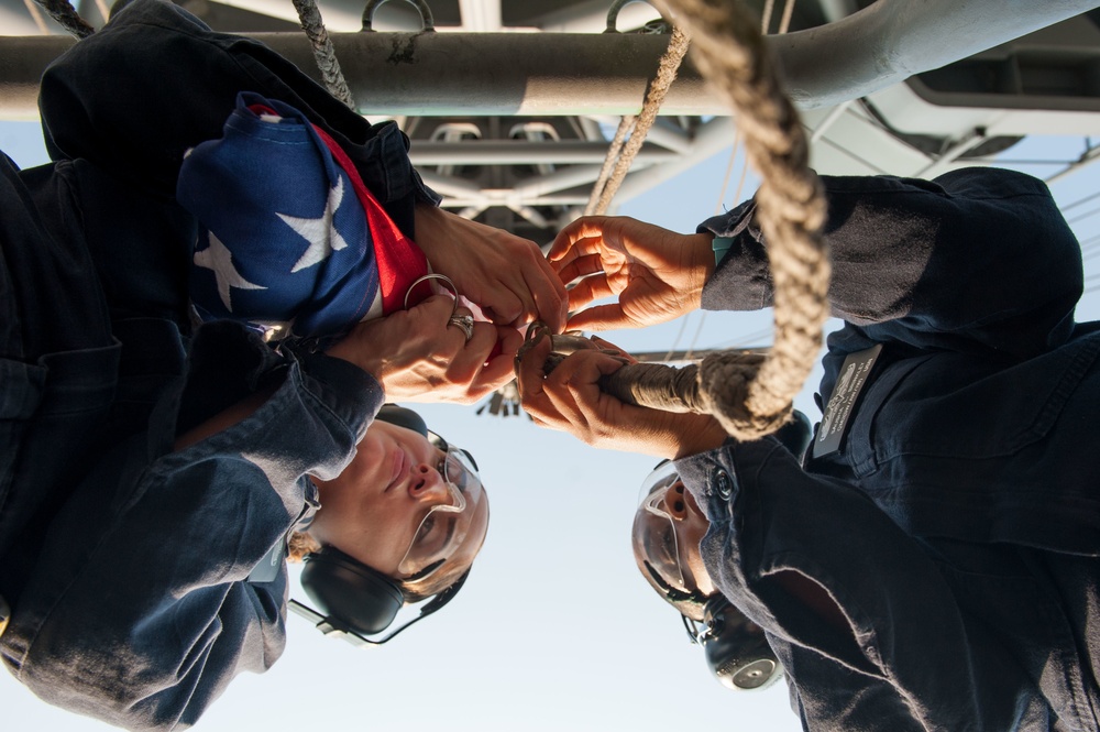 USS America Sailors raise ensign
