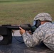 Army Reserve Soldier qualifies on rifle range with protective gas mask