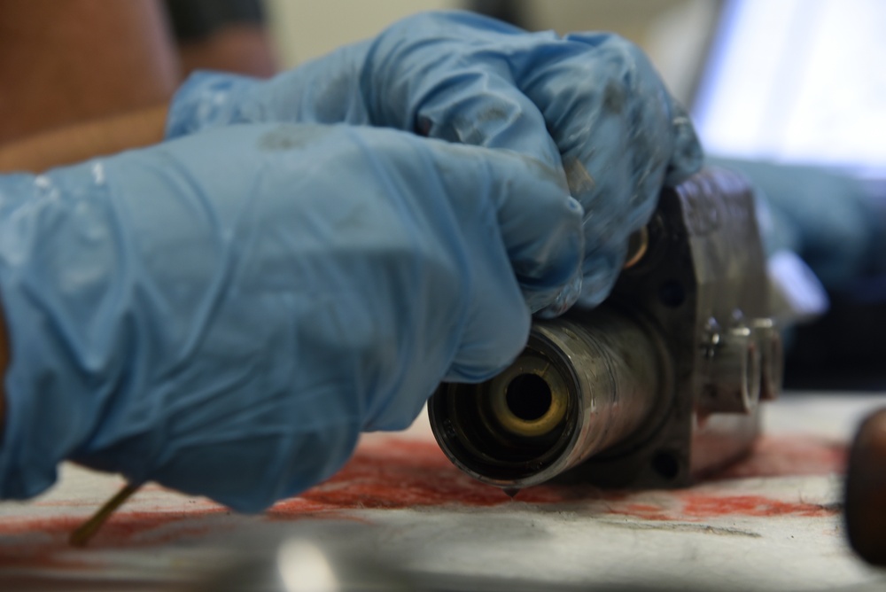 22nd MXS Airmen repair spoiler actuator