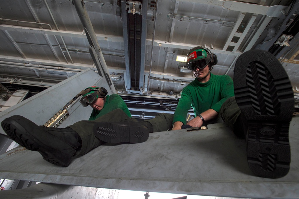 Marines Work on Nimitz Hangar Bay