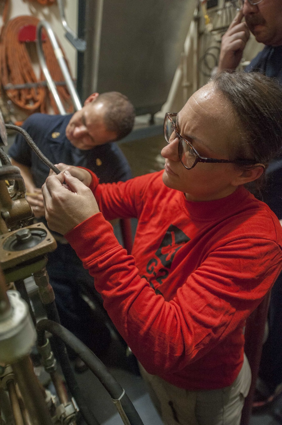 USS America Sailors repair sprinkler system