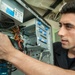 USS America Sailor repairs computer