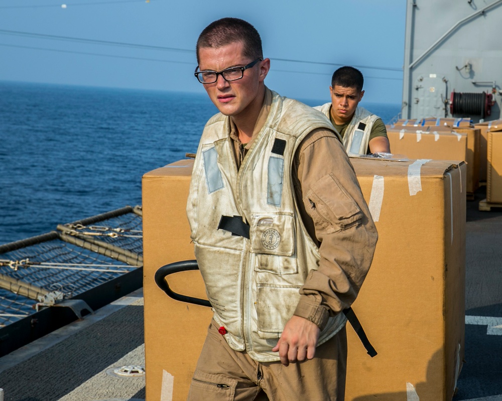Resupply at sea aboard USS Pearl Harbor (LSD 52)