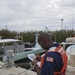 Coast Guard members assess vessels in the Florida Keys