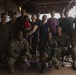 U.S. Marines help young evacuee on Dominica