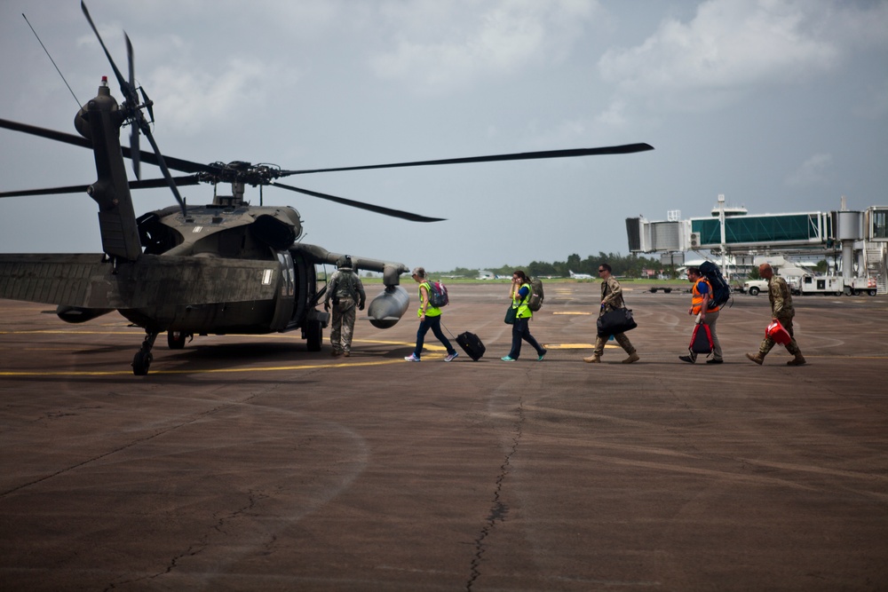 JTF - Leeward Islands Black Hawk helicopters transport relief personnel to Dominica