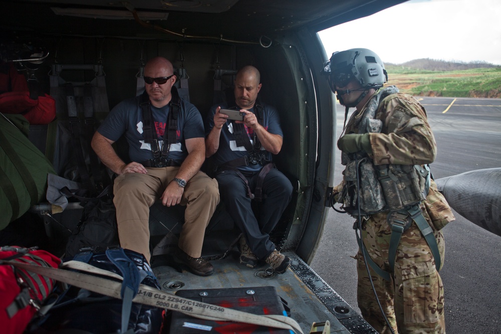 JTF - Leeward Islands Black Hawk helicopters transport relief personnel to Dominica