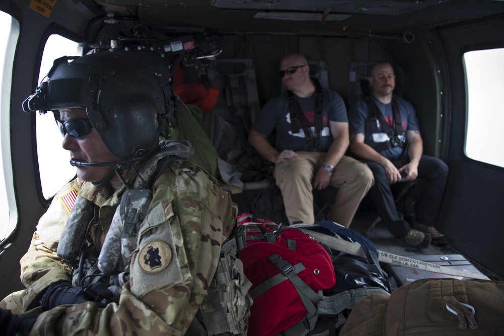 JTF - Leeward Islands Black Hawk helicopters transport relief personnel to Dominica