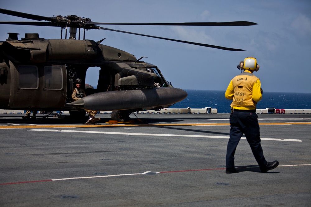 JTF - Leeward Islands Black Hawk helicopters transport relief personnel to Dominica