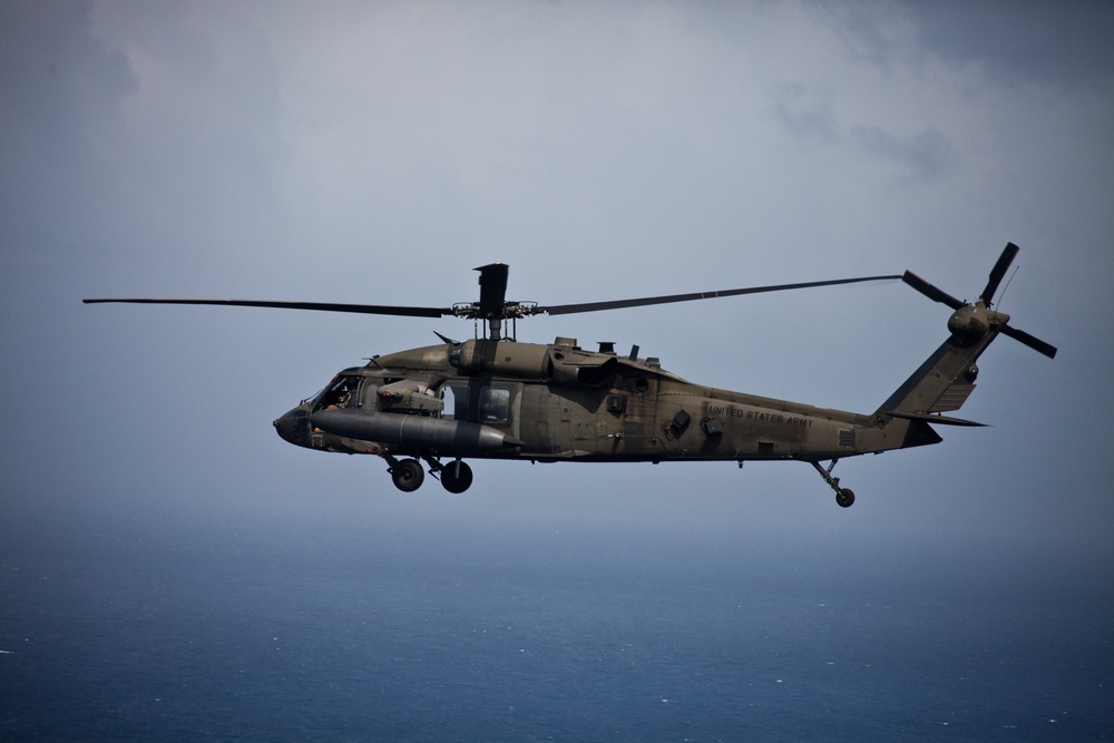 JTF - Leeward Islands Black Hawk helicopters transport relief personnel to Dominica