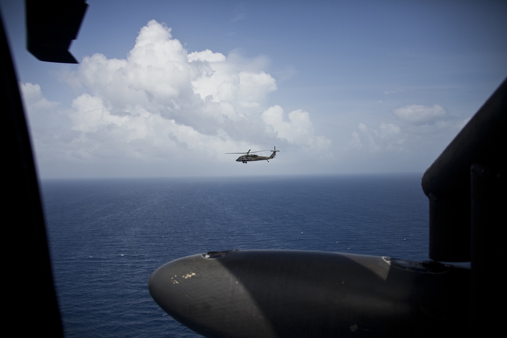 JTF - Leeward Islands Black Hawk helicopters transport relief personnel to Dominica
