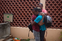 U.S. military efforts in Dominica reunite father, son