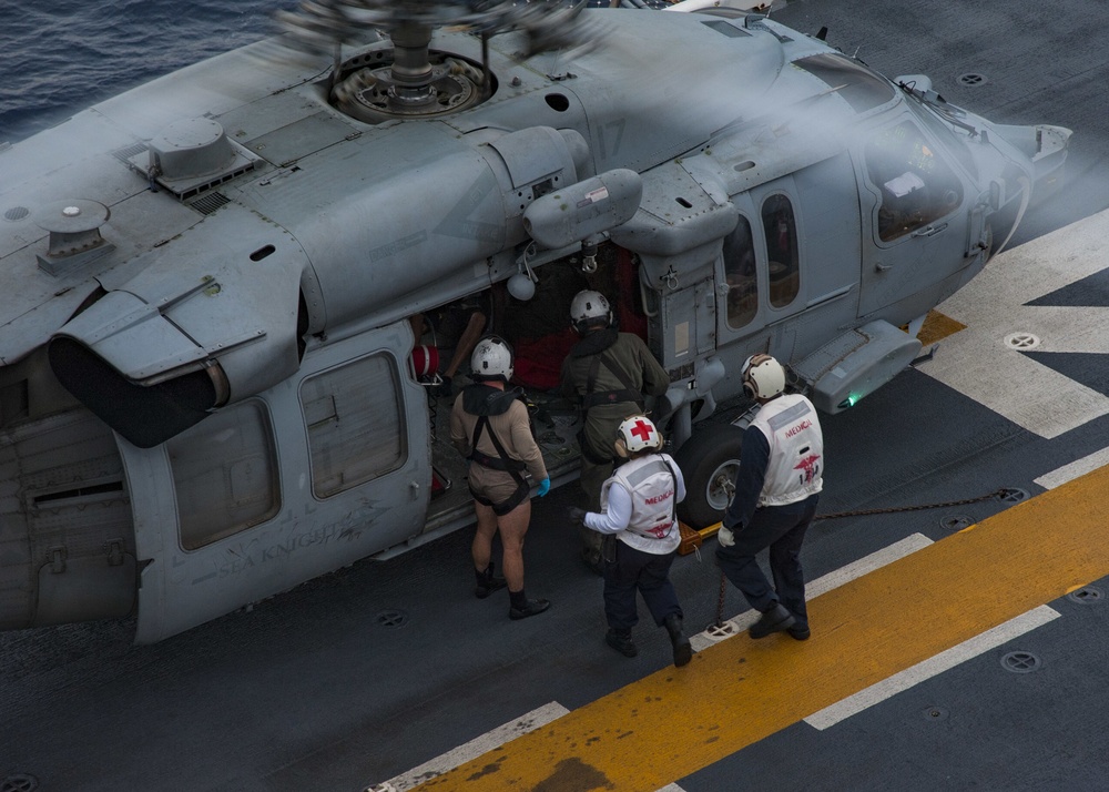Sailors aboard USS Wasp (LHD 1) rescue two civilians