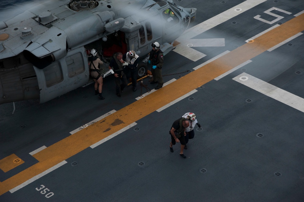 Sailors aboard USS Wasp (LHD 1) rescue two civilians