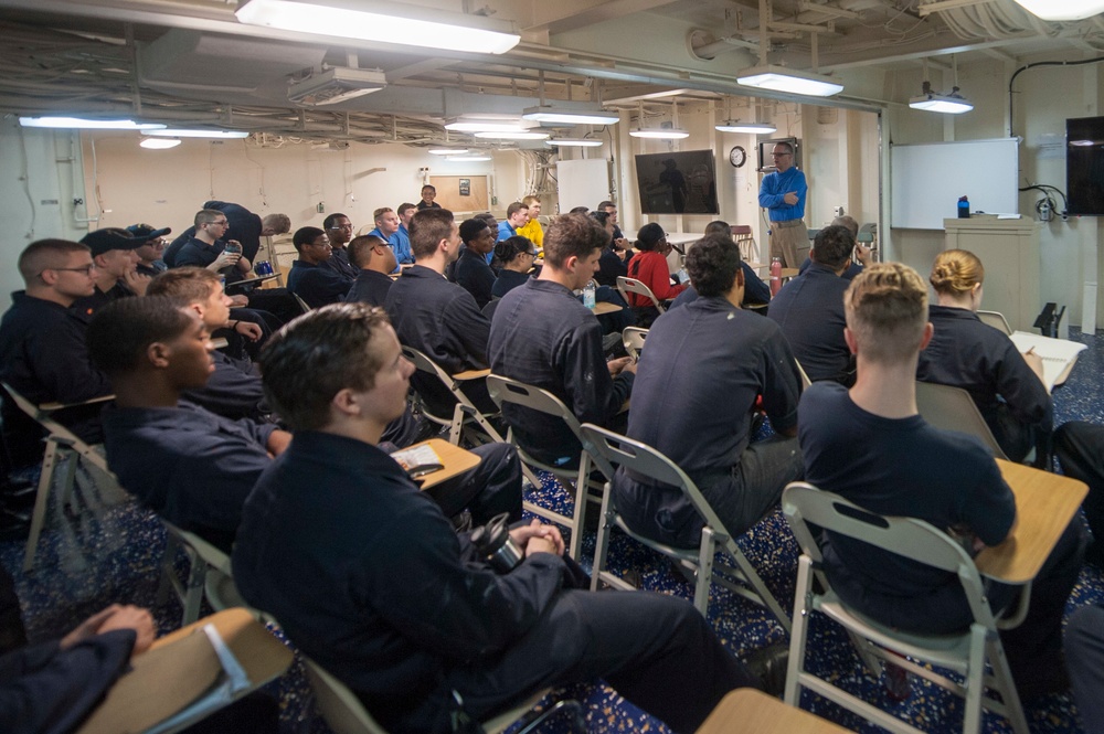 USS America CMC speaks with junior Sailors