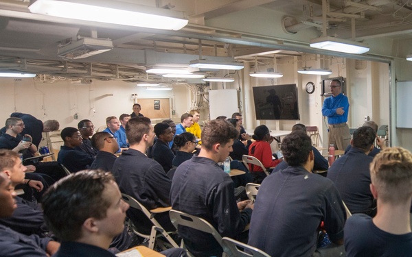 USS America CMC speaks with junior Sailors