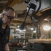 USS America Sailor creates walling plaque