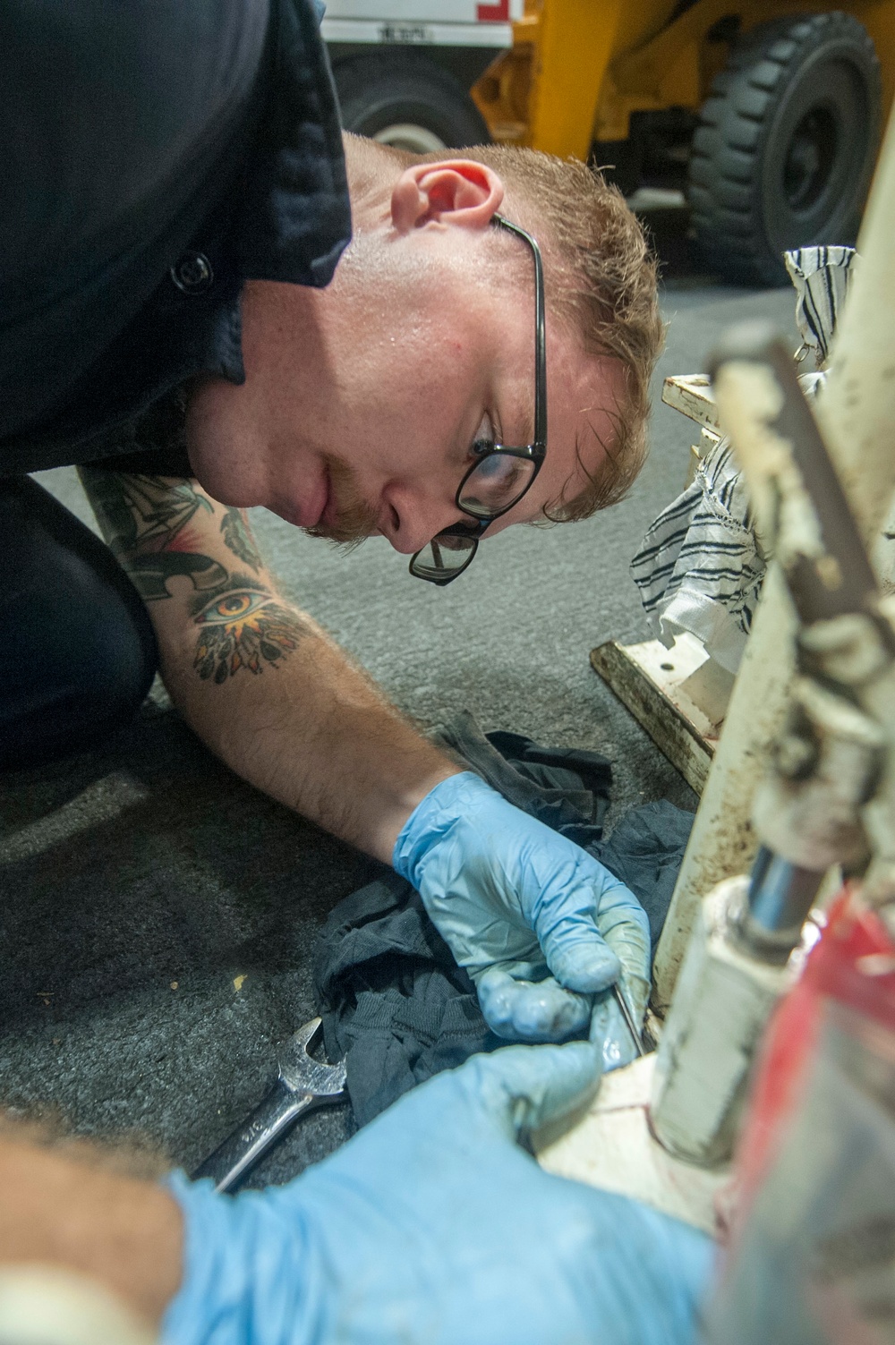 USS America Sailor tests hydraulic lift