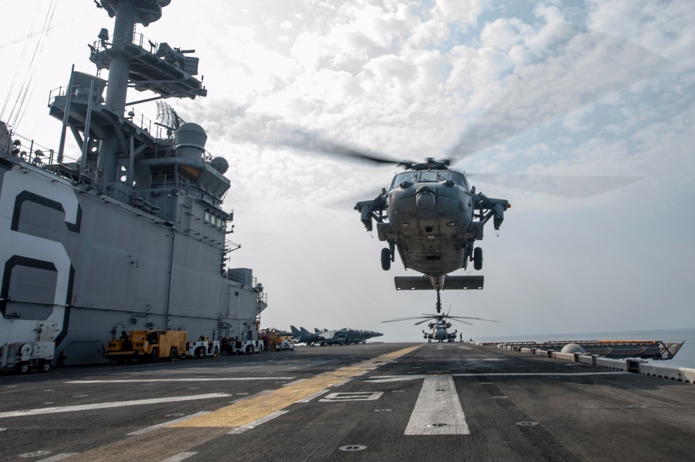 USS America helicopter lifts off