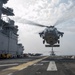 USS America helicopter lifts off