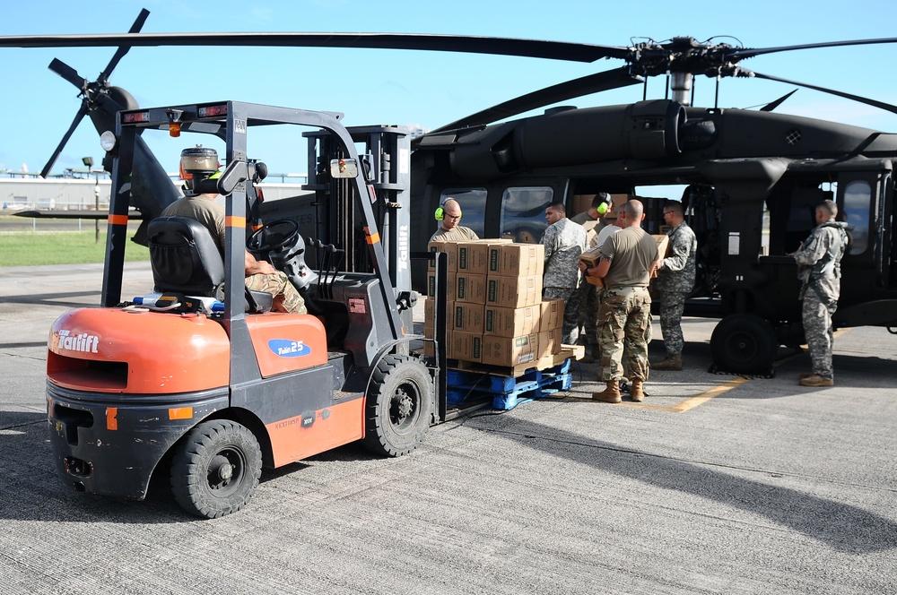 Puerto Rico National Guard Distribute Water And Food