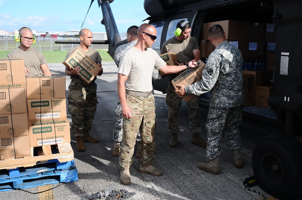 Puerto Rico National Guard Distribute Water And Food