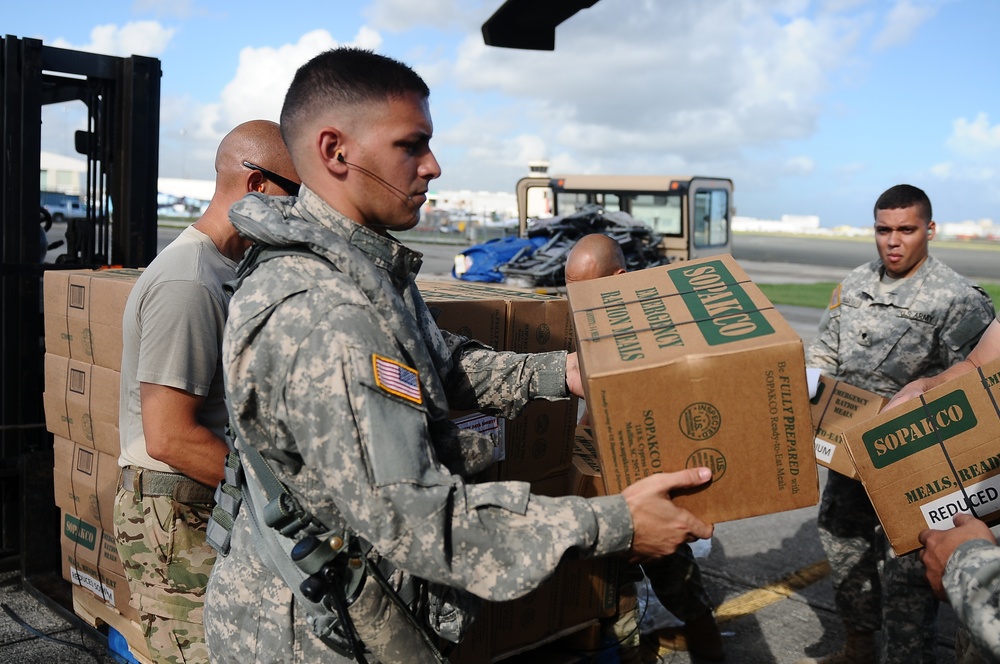 Puerto Rico National Guard Distribute Water And Food