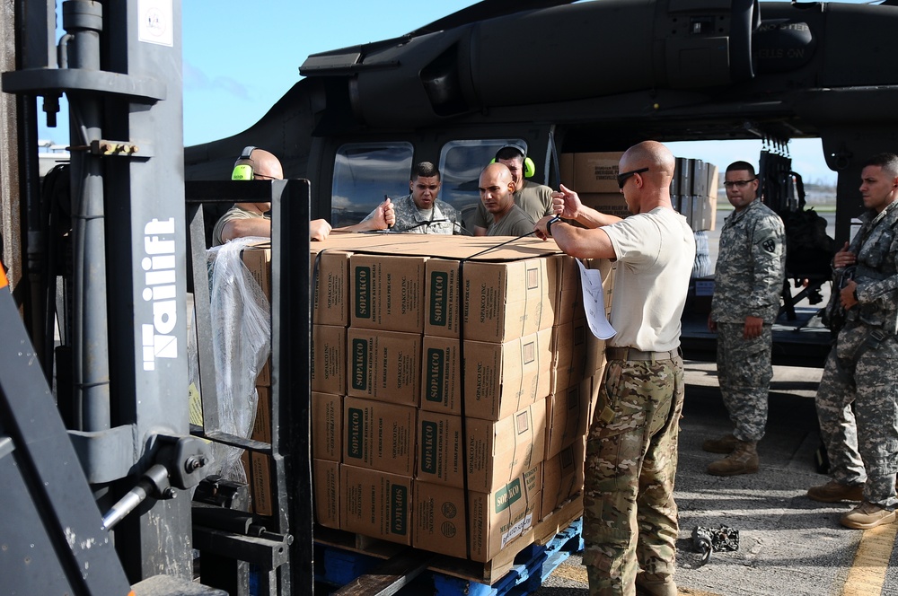 Puerto Rico National Guard Distribute Water And Food