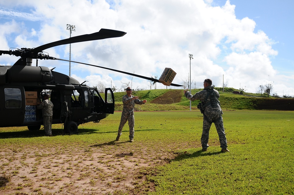 Puerto Rico National Guard Distribute Water And Food