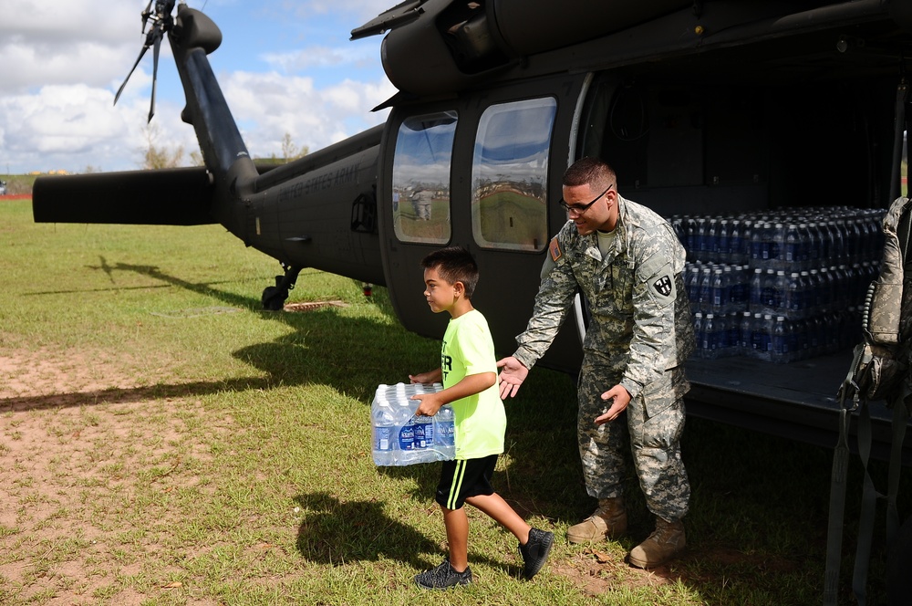 Puerto Rico National Guard Distribute Water And Food