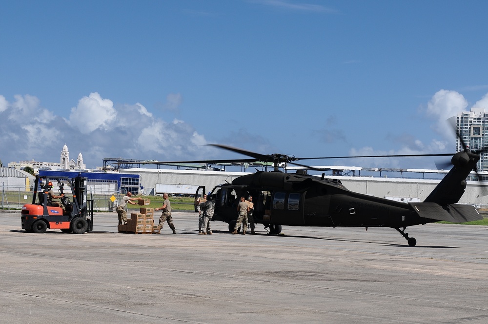 Puerto Rico National Guard Distribute Water And Food