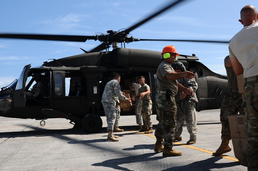 Puerto Rico National Guard Distribute Water And Food