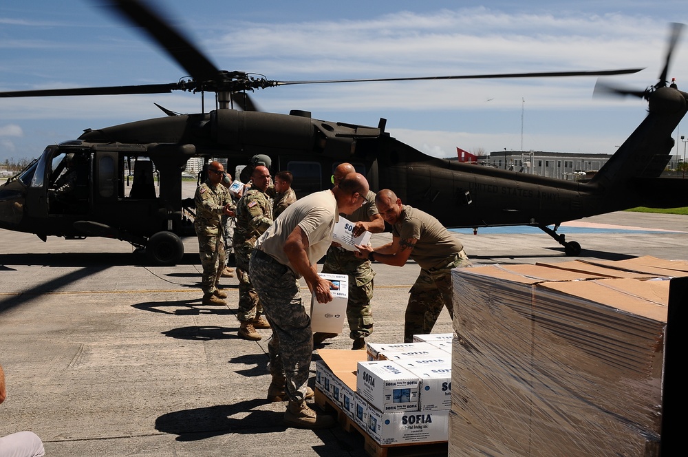 Puerto Rico National Guard Distribute Water And Food