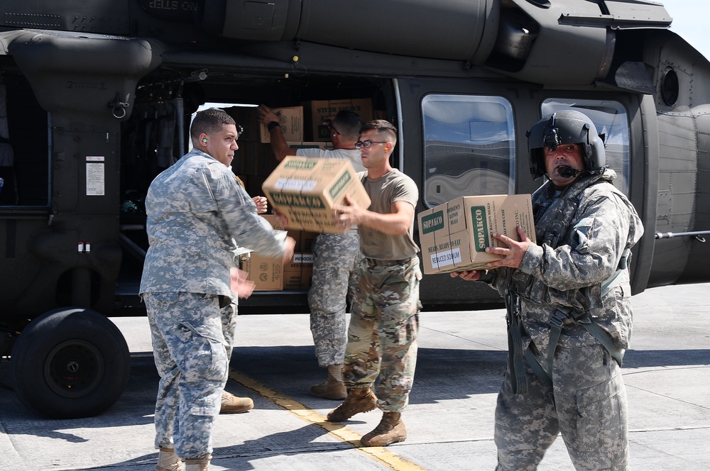 Puerto Rico National Guard Distribute Water And Food