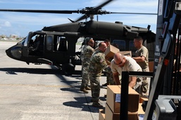Puerto Rico National Guard Distribute Water And Food