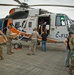 Loading helicopter with FEMA meals