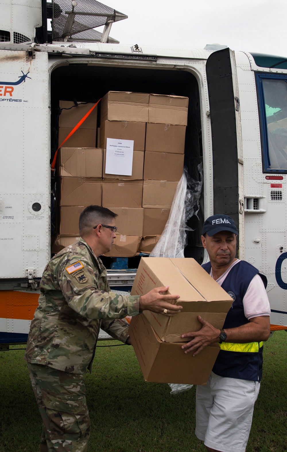 Delivering FEMA meals to Comerío