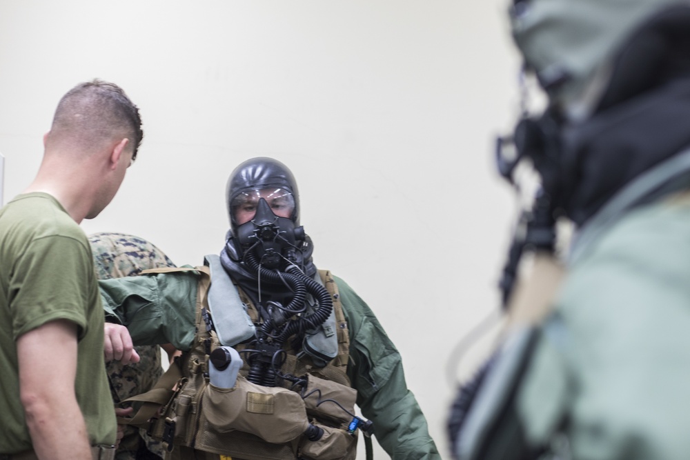 VMFA-251 pilots maintain CBRN equipment skills during training drills