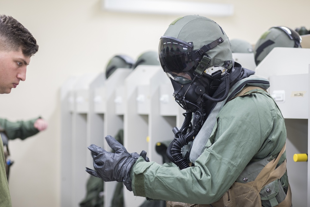 VMFA-251 pilots maintain CBRN equipment skills during training drills