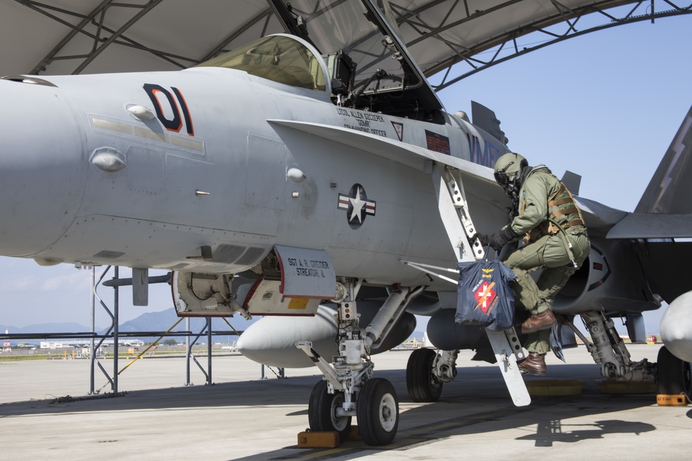 VMFA-251 pilots maintain CBRN equipment skills during training drills